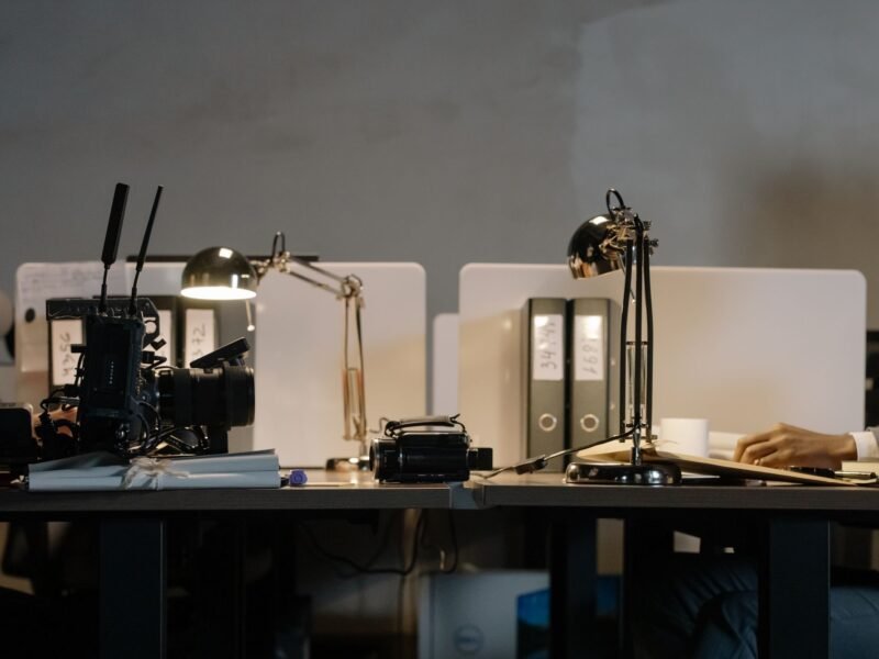 Designers' desks with lamps in a studio office
